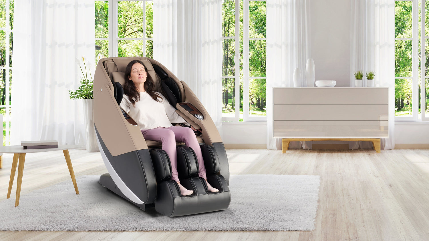 Woman relaxing in beige and black full body massage chair with calf massager