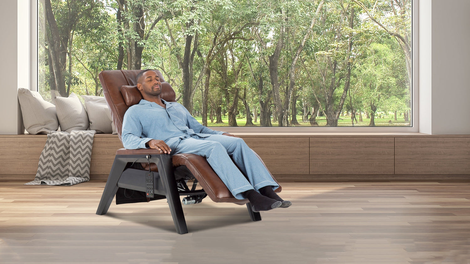Man relaxing in brown leather zero gravity chair with dark frame and tree view