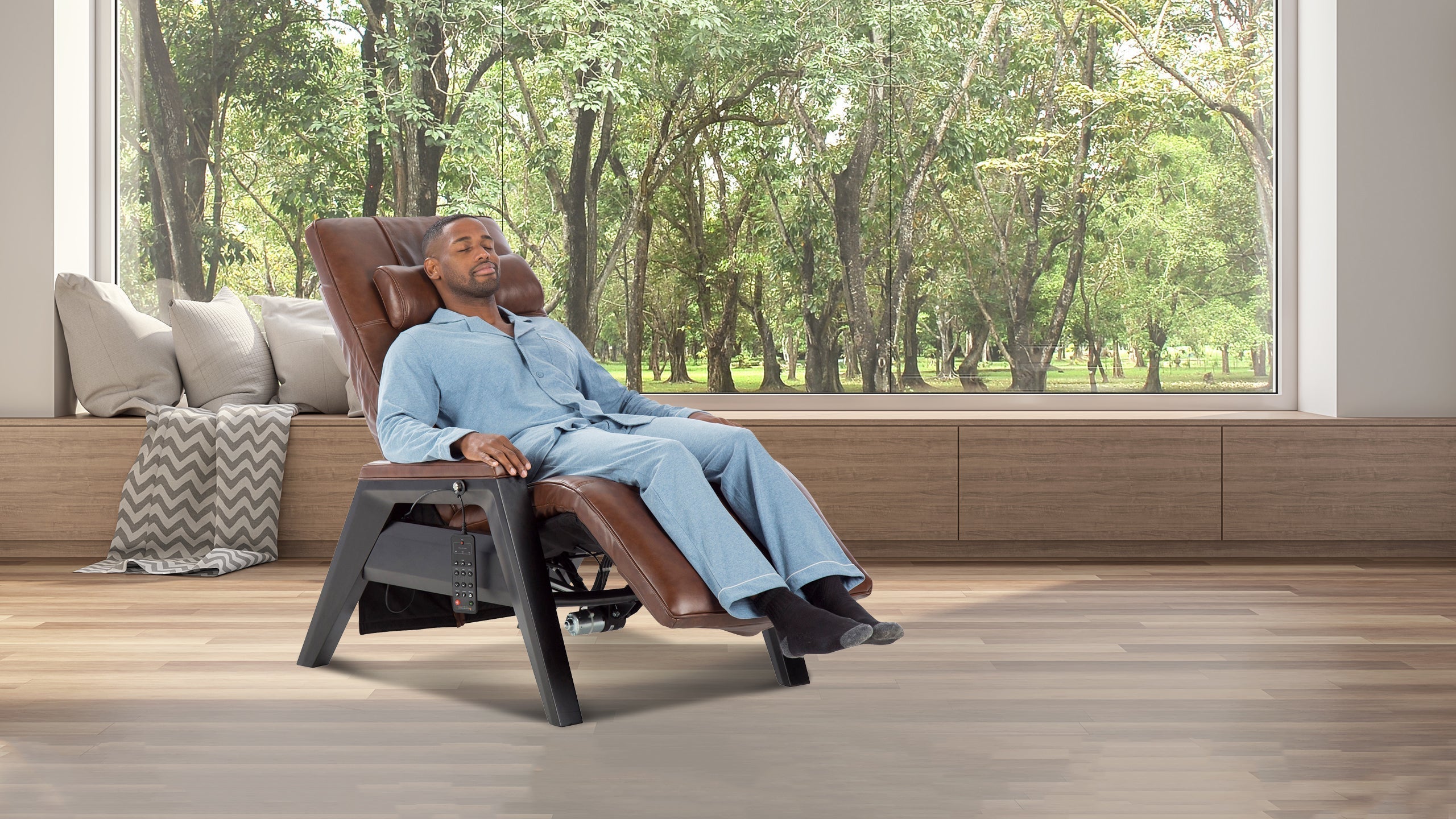 Man relaxing in brown leather zero gravity chair with dark frame and tree view