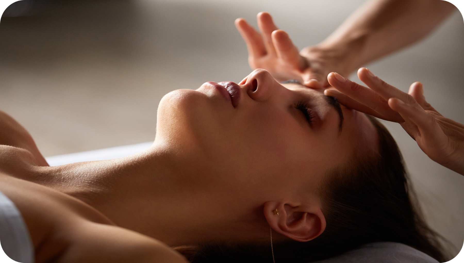 Woman getting facial massage