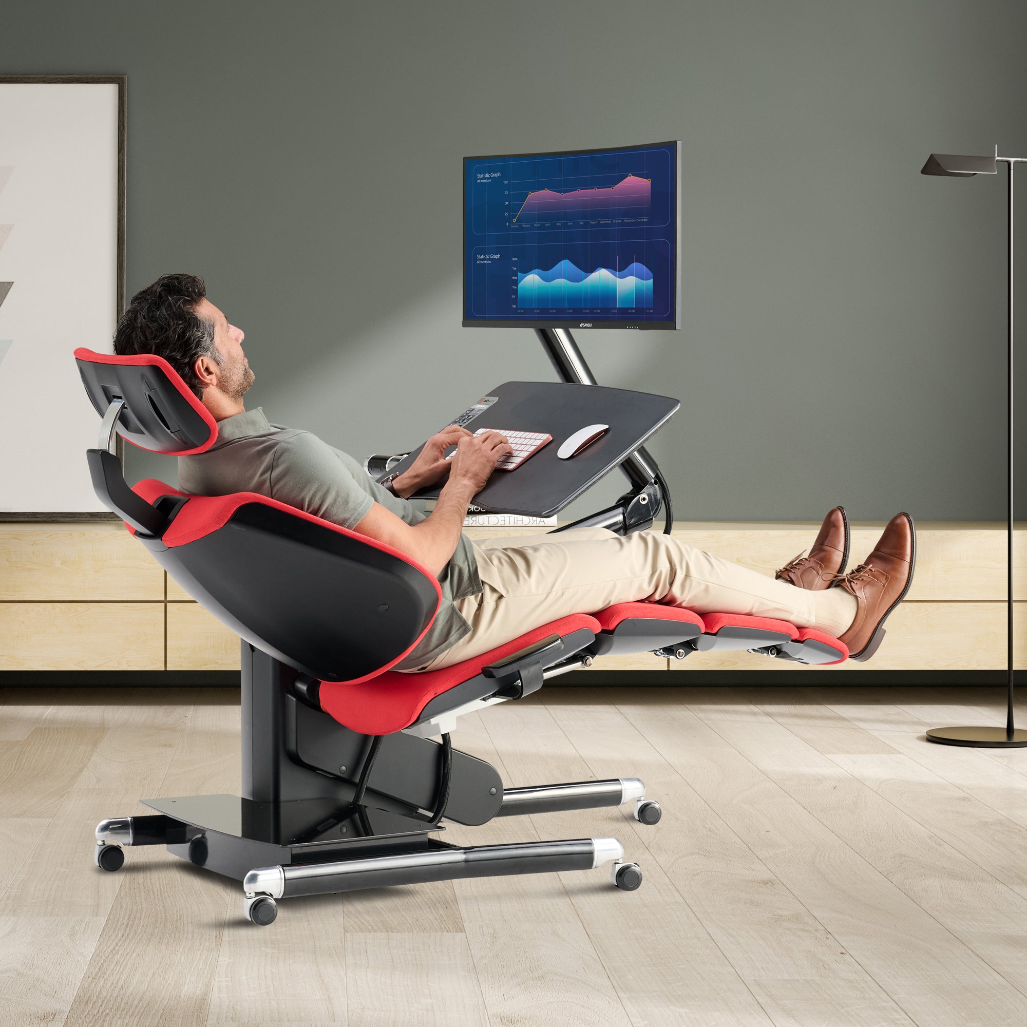 Altwork Signature Station shown in reclined position with adjustable monitor mount and ergonomic desk setup
