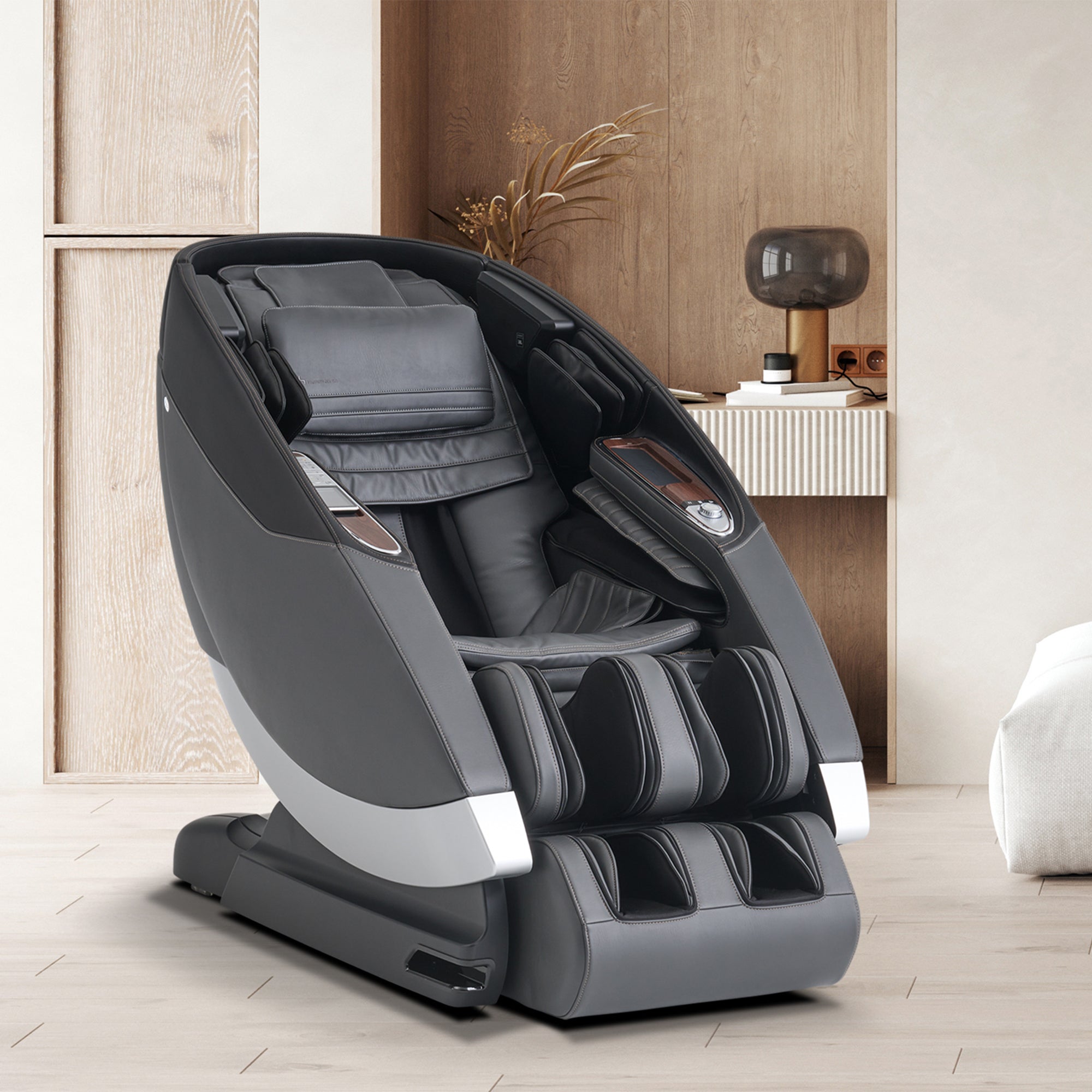 Super Novo 2.0 Massage Chair in sleek gray and black design, positioned in modern minimal room setting