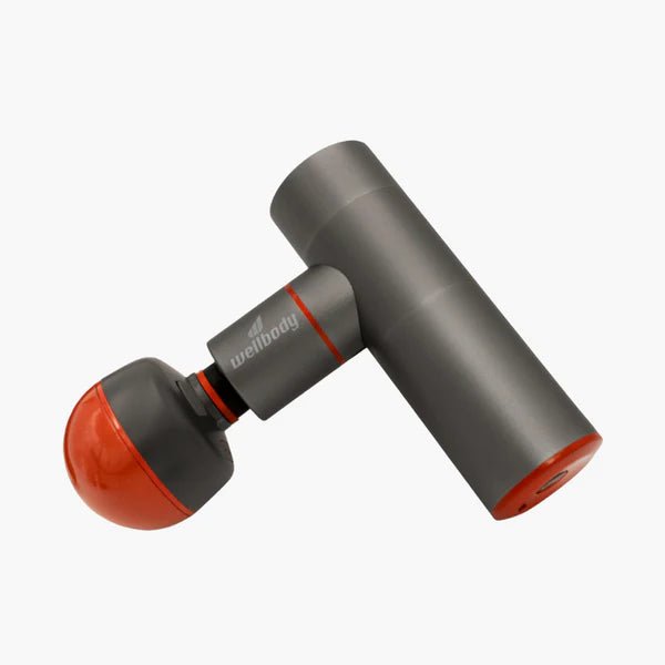 Gray and red massage gun with 'wellbody' branding on a white background