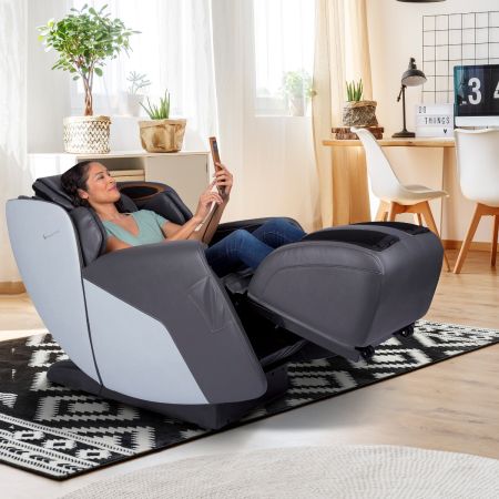 Quies Massage Chair - Woman using remote